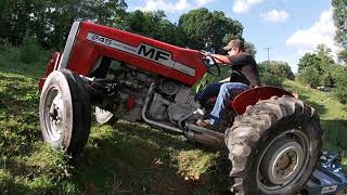 Mowing steep Pasture with a 2 wheel drive Massey Ferguson [upl. by Neely511]